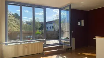 Fensterfront zur Dachterrasse